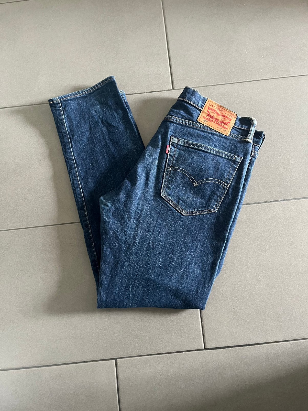 Levi’s 502 spijkerbroek, Ophalen of Verzenden, Zo goed als nieuw, Blauw, W32 (confectie 46) of kleiner