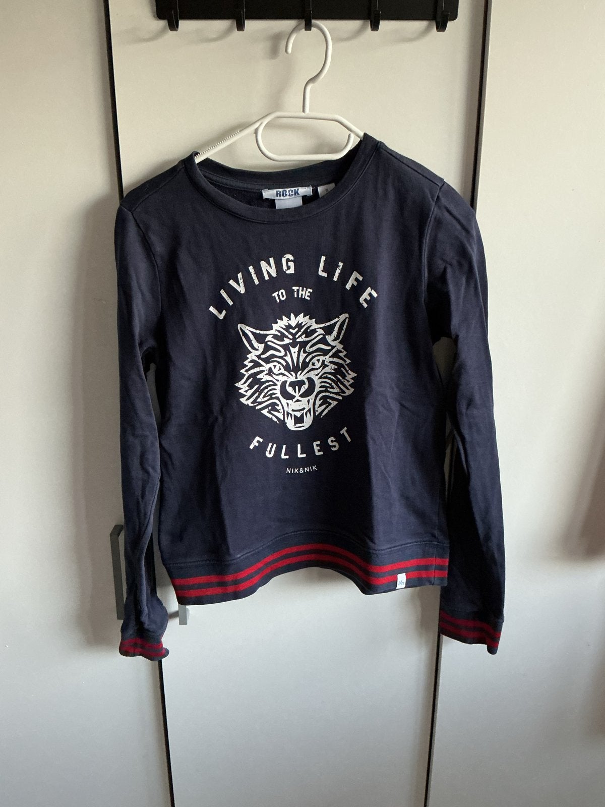 Donkerblauwe NIK&NIK sweater met wolf print - Maat 14/164, Ophalen of Verzenden, Gebruikt, Meisje, Trui of Vest
