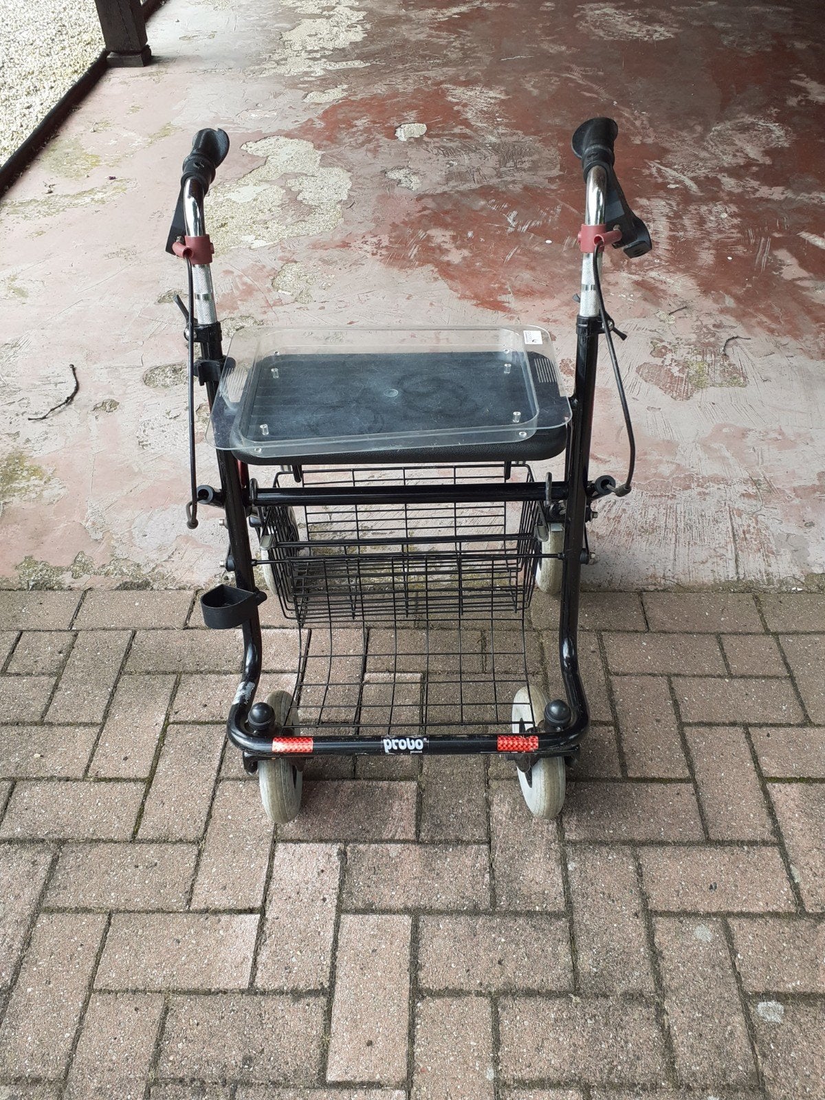 Rollator gebruikt., Ophalen