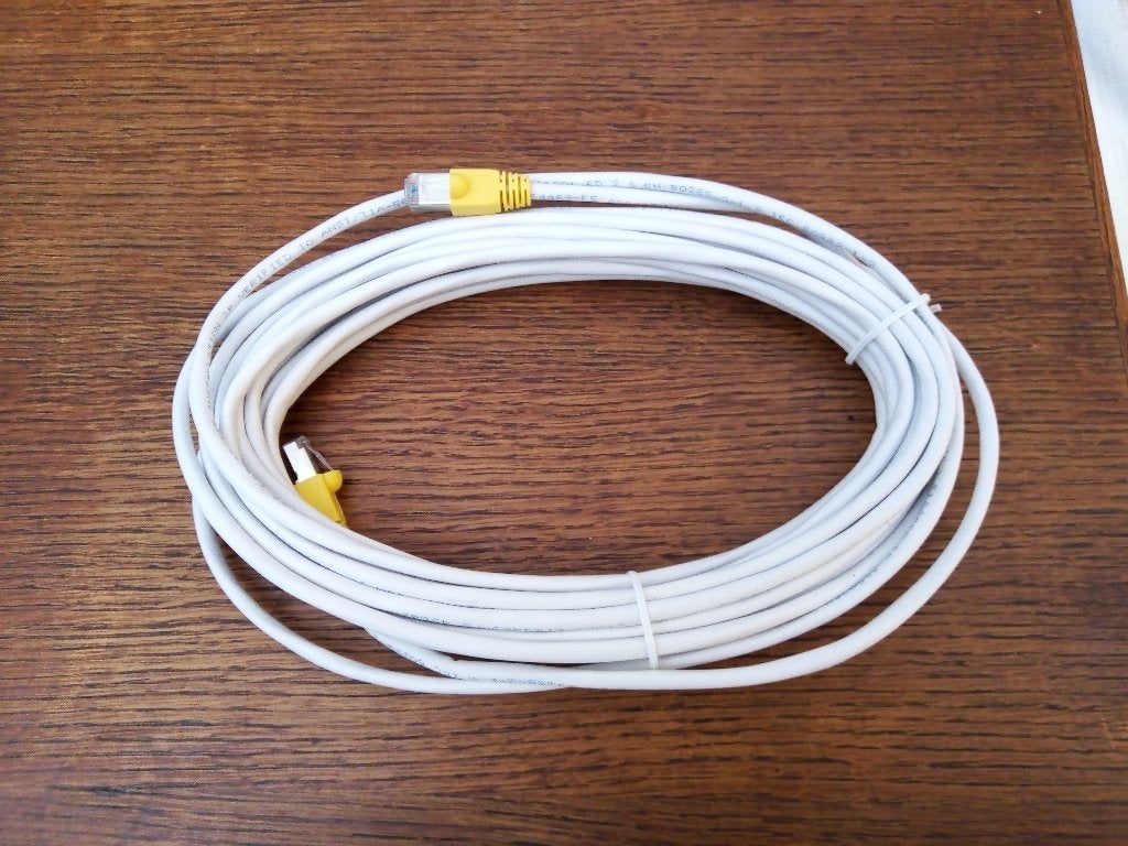 Nieuwe KPN Ethernetkabel geel / internetkabel - 10 meter, Computers en Software, Ophalen of Verzenden, Nieuw