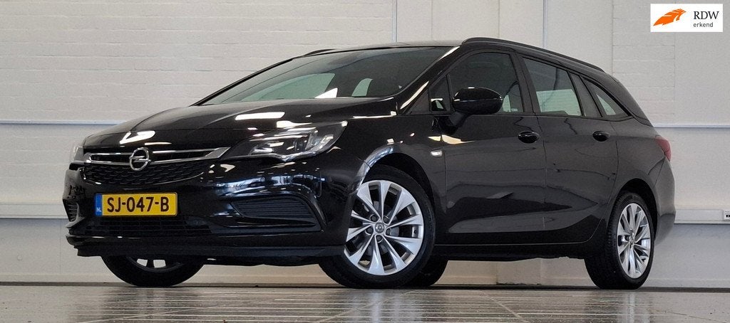 Opel Astra Sports Tourer 1.0T Innovation Navigatie Garantie, Auto's, Opel, Voorwielaandrijving, Stof, Gebruikt, 1178 kg