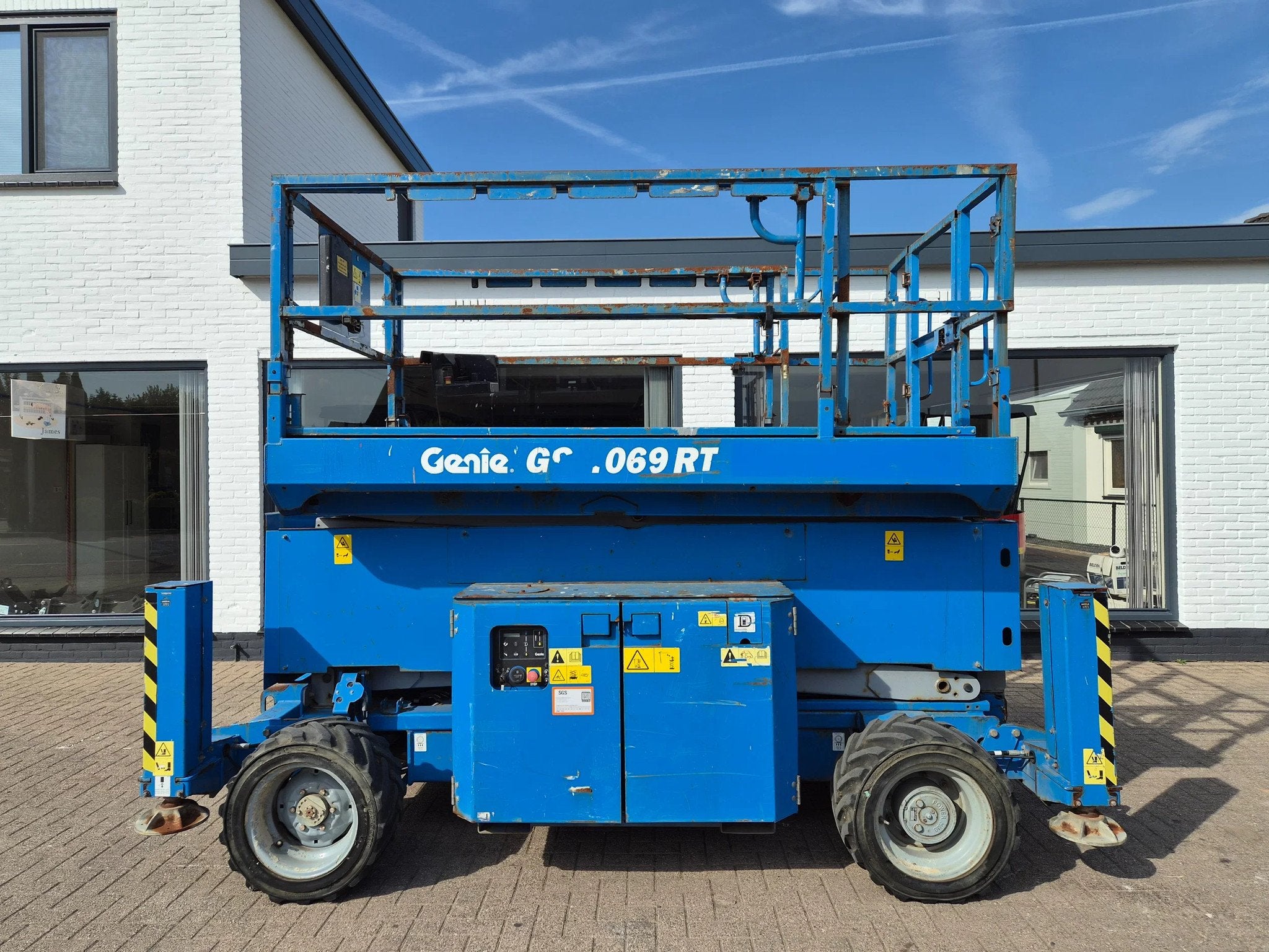 Genie Gs4069rt 4x4 schaarhoogwerker ruwterein (bj 2014)