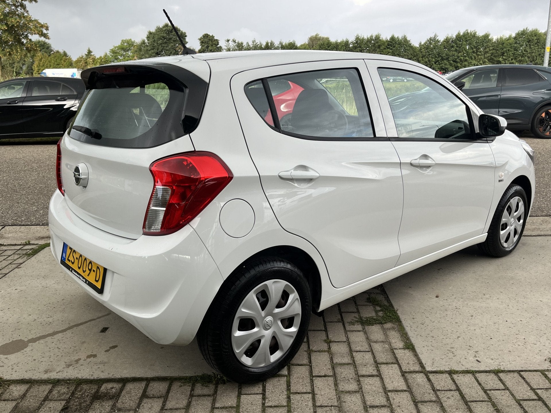 Opel KARL 1.0 ecoFLEX 120 Jaar Edition / Cruise / Airco / El, Auto's, Opel, Stof, Wit, Origineel Nederlands, Bedrijf