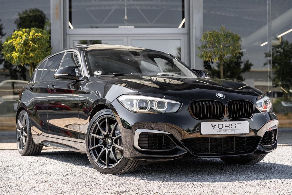 BMW 1-serie M140i Edition Shadow High Executive, Auto's, BMW, Achterwielaandrijving, Gebruikt, Zwart, Bedrijf