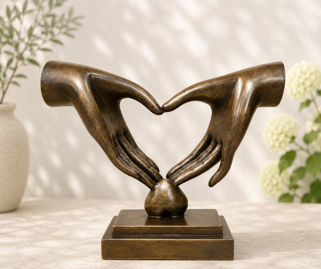 2 HANDEN HARTMAKEND / Bronzen beeld