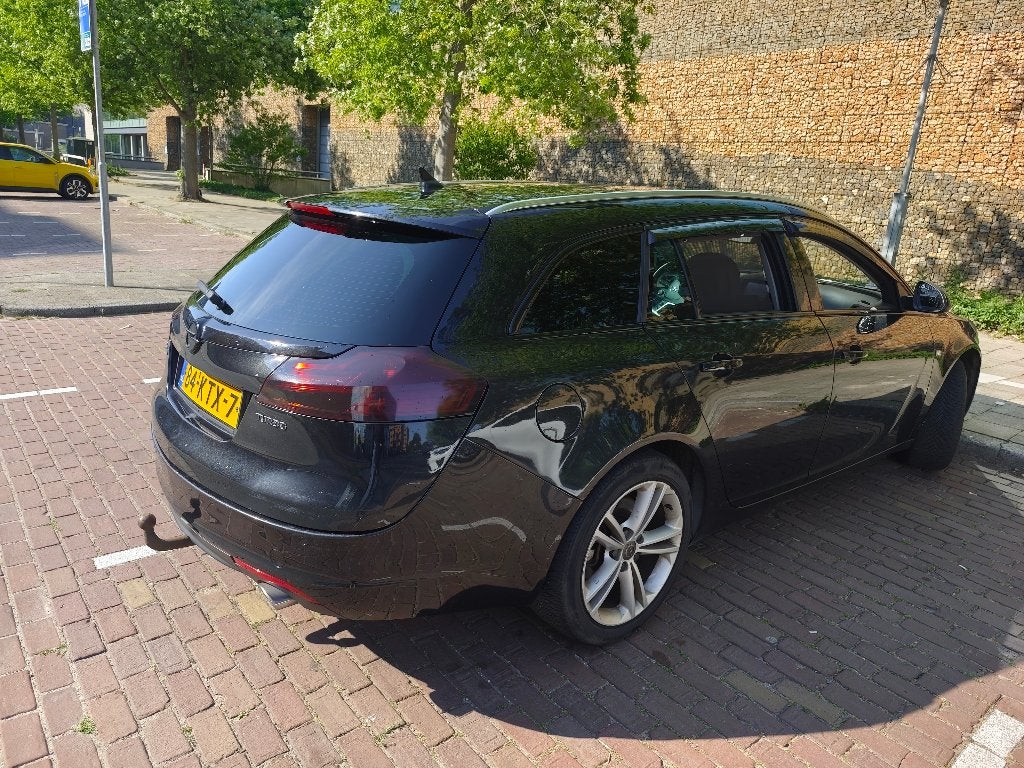 Opel Insignia 1.6 Turbo Sport Tourer 180pk 2010 Zwart, Auto's, Opel, 4 cilinders, 179 pk, Leder en Stof, Zwart