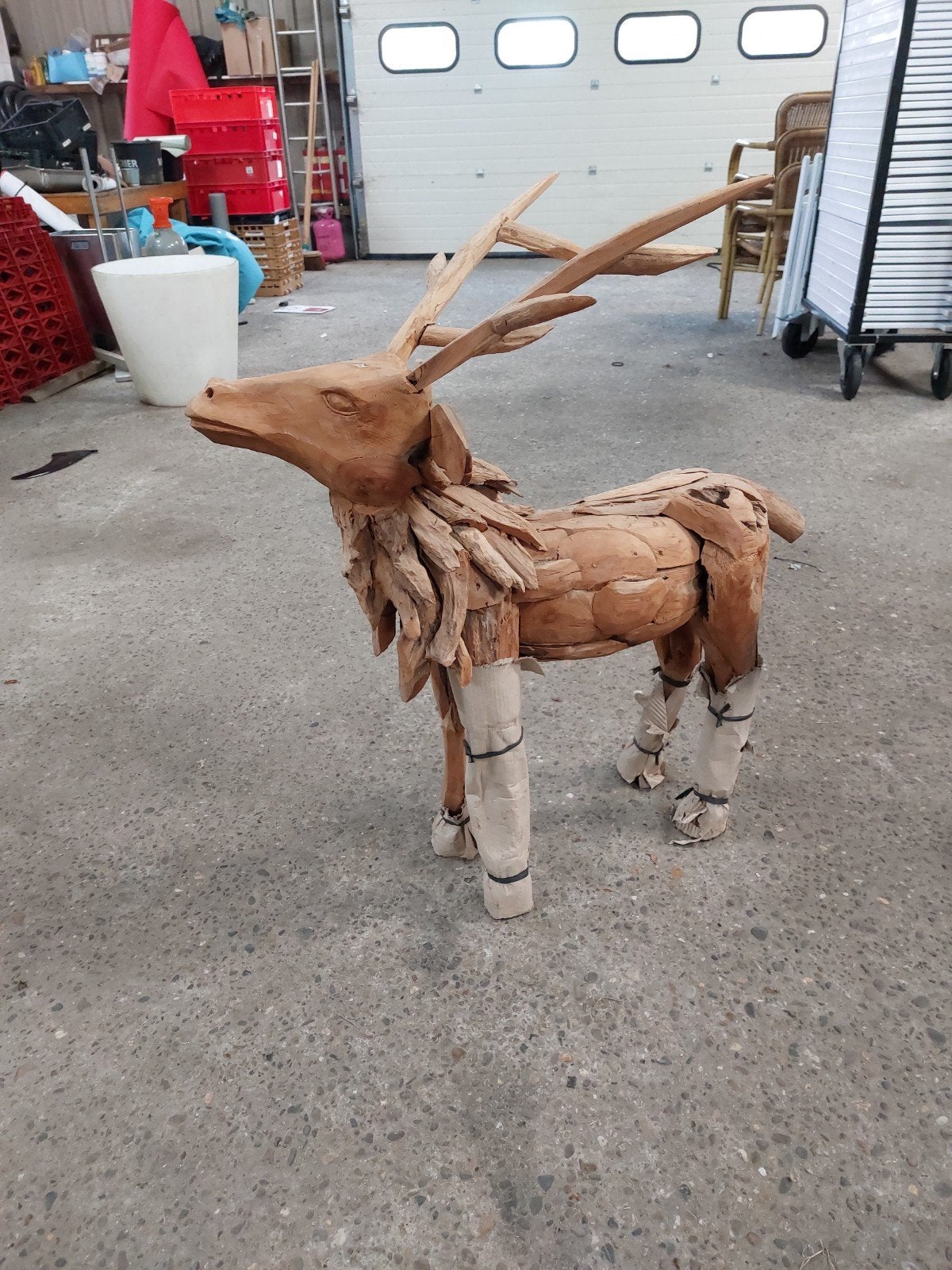 Houten hert, Ophalen