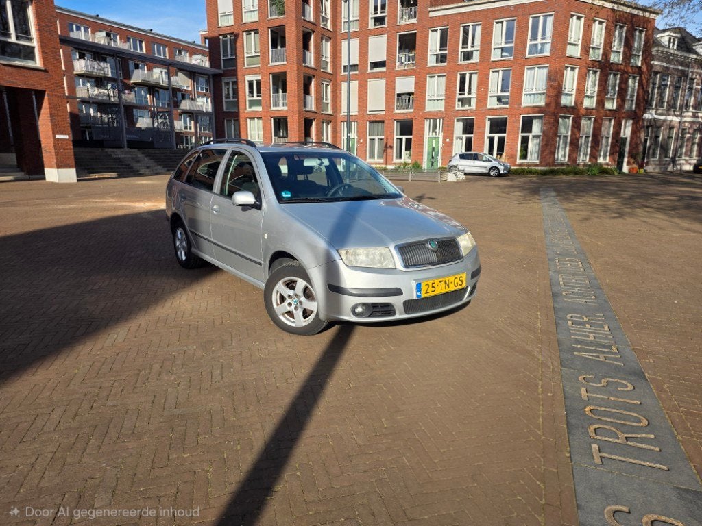 Skoda Fabia Combi 1.4-16V Elegance, Auto's, Skoda, Gebruikt, Zwart, 4 cilinders, Startonderbreker