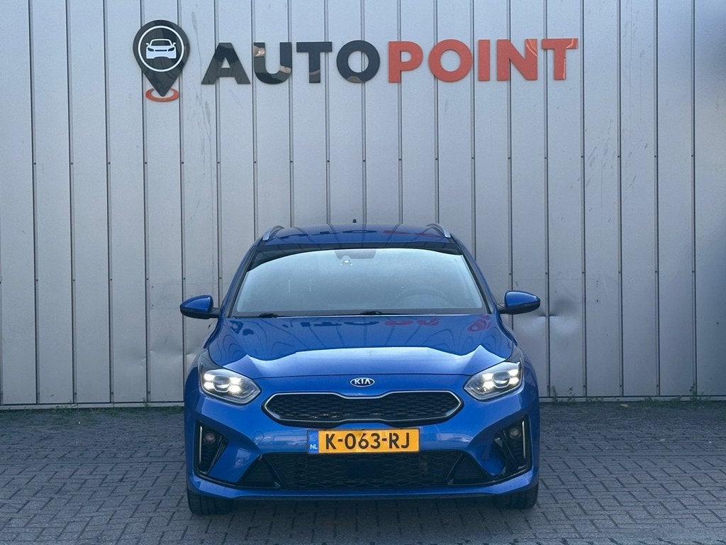 Kia Ceed Sportswagon 1.6 GDI PHEV Dynamic+Line 1E EIG ORG NL, Auto's, Kia, 8 kWh, Gebruikt, Blauw, Leder en Stof