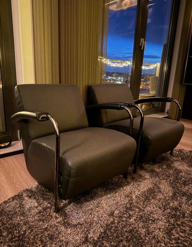 2x Leolux Scylla fauteuil - Grijze stof met leren armleuning, Huis en Inrichting, Fauteuils, Ophalen, 75 tot 100 cm, Zo goed als nieuw