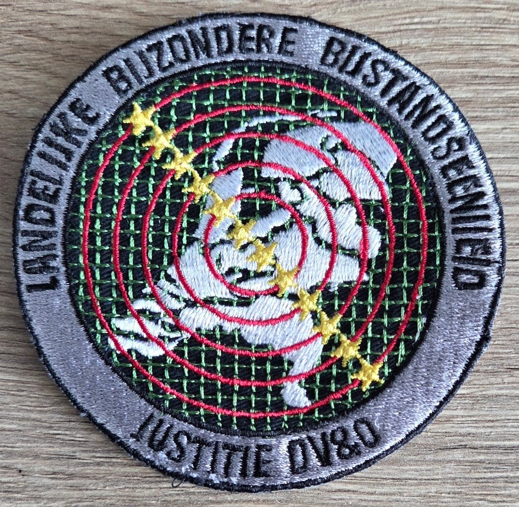Te ruil/ Justitie DV&O embleem, Ophalen of Verzenden, Landmacht, Nederland, Embleem of Badge