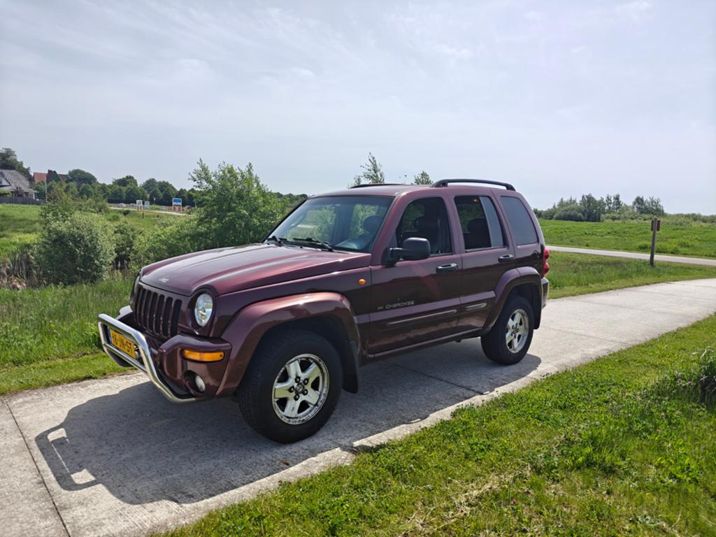 Jeep Cherokee 3.7 V6 AUT 2002 Rood, Auto's, Jeep, Automaat, 3700 cc, Zwart, Vierwielaandrijving