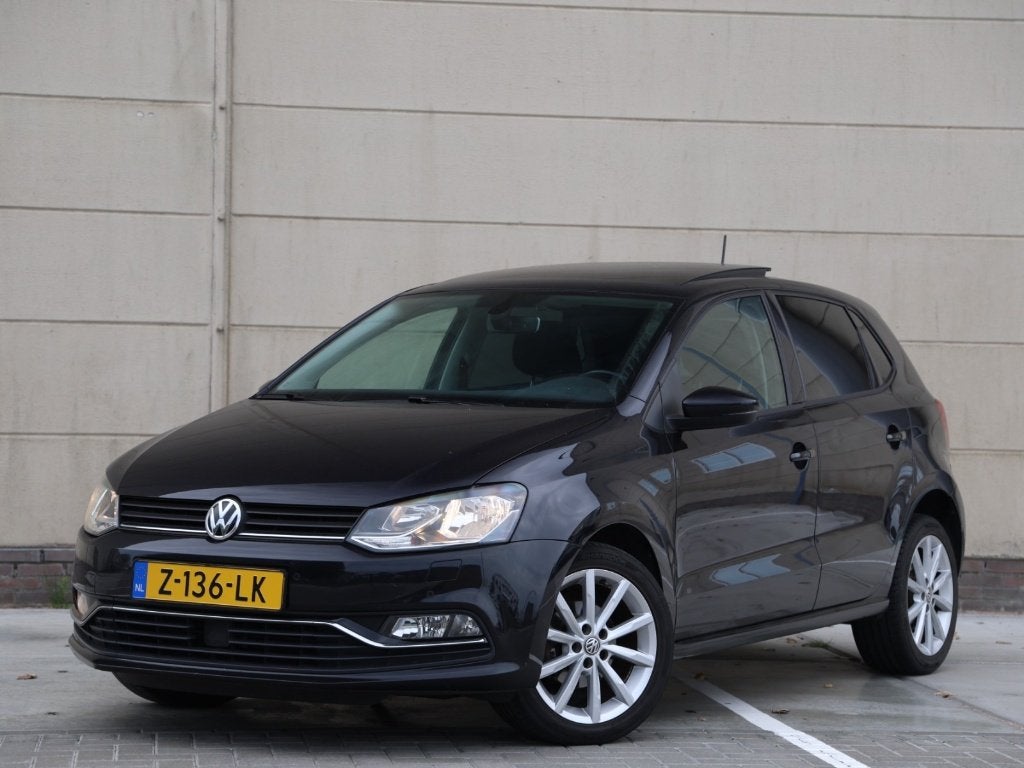 Volkswagen Polo 1.2 TSI 66KW 2014 Zwart, Auto's, Stof, 40 €/maand, Zwart, 4 cilinders