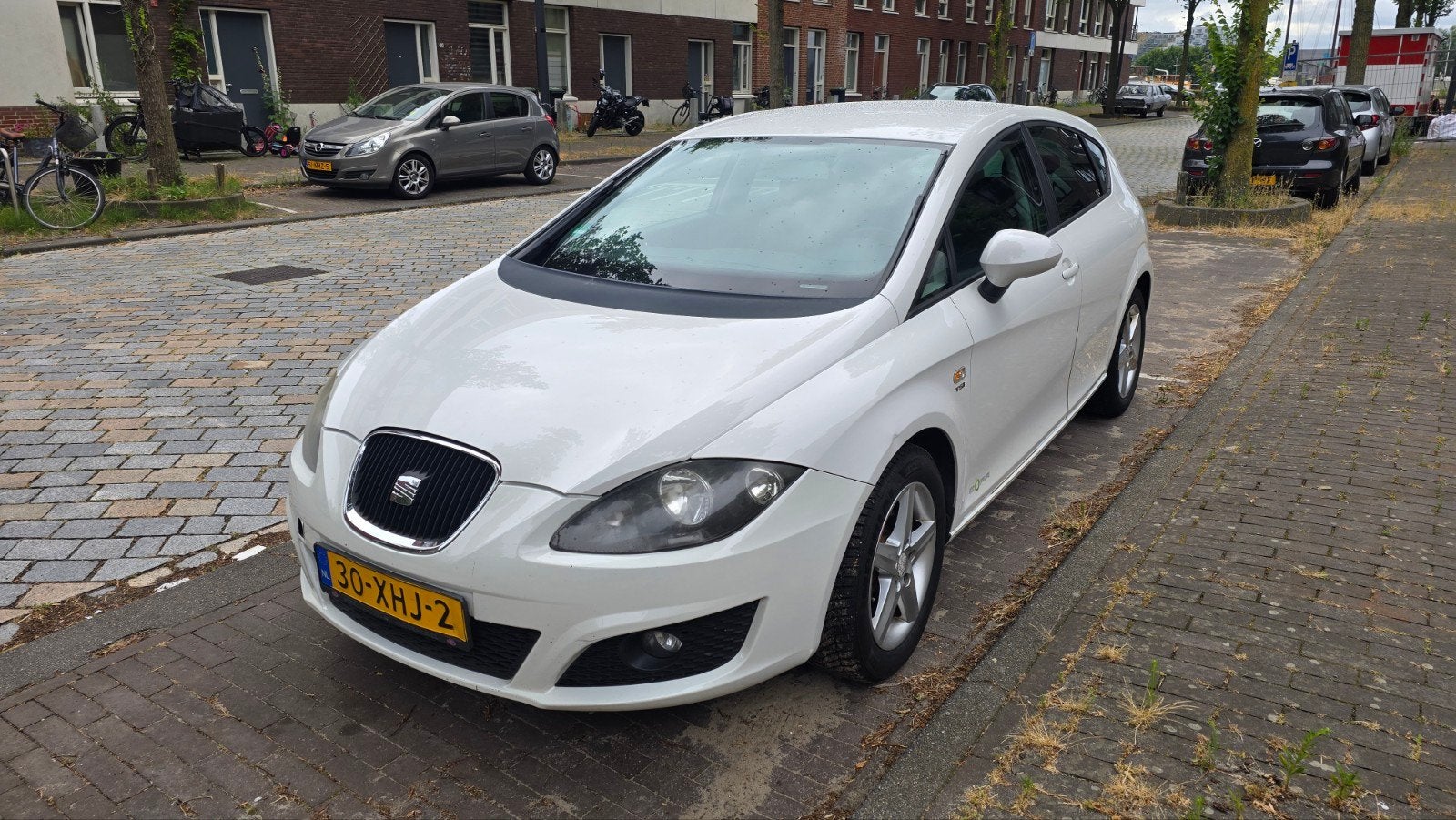 Seat Leon 1.2 TSI 77KW 2012 Wit, Auto's, Seat, Leon, Adaptive Cruise Control, Benzine, A, Hatchback, Handgeschakeld, Origineel Nederlands