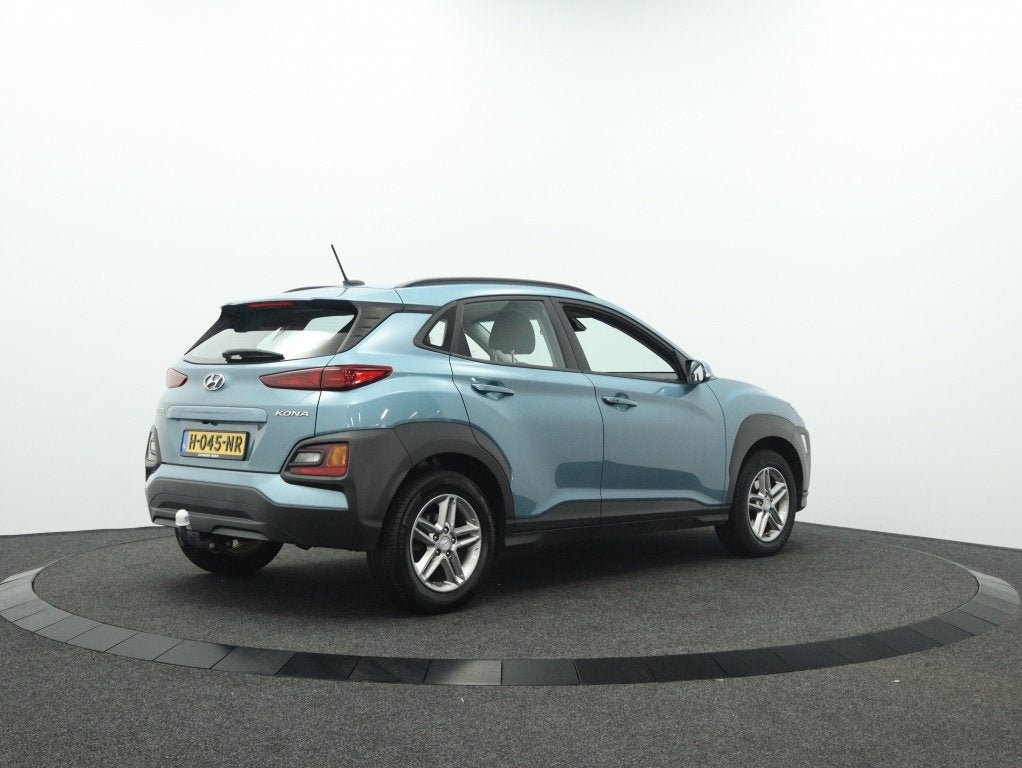 Hyundai KONA 1.0 T-GDI Essence luxe | Keyless | Carplay navi, Auto's, Keurmerk '100% Onderhouden', 12 maanden, Stof, Gebruikt