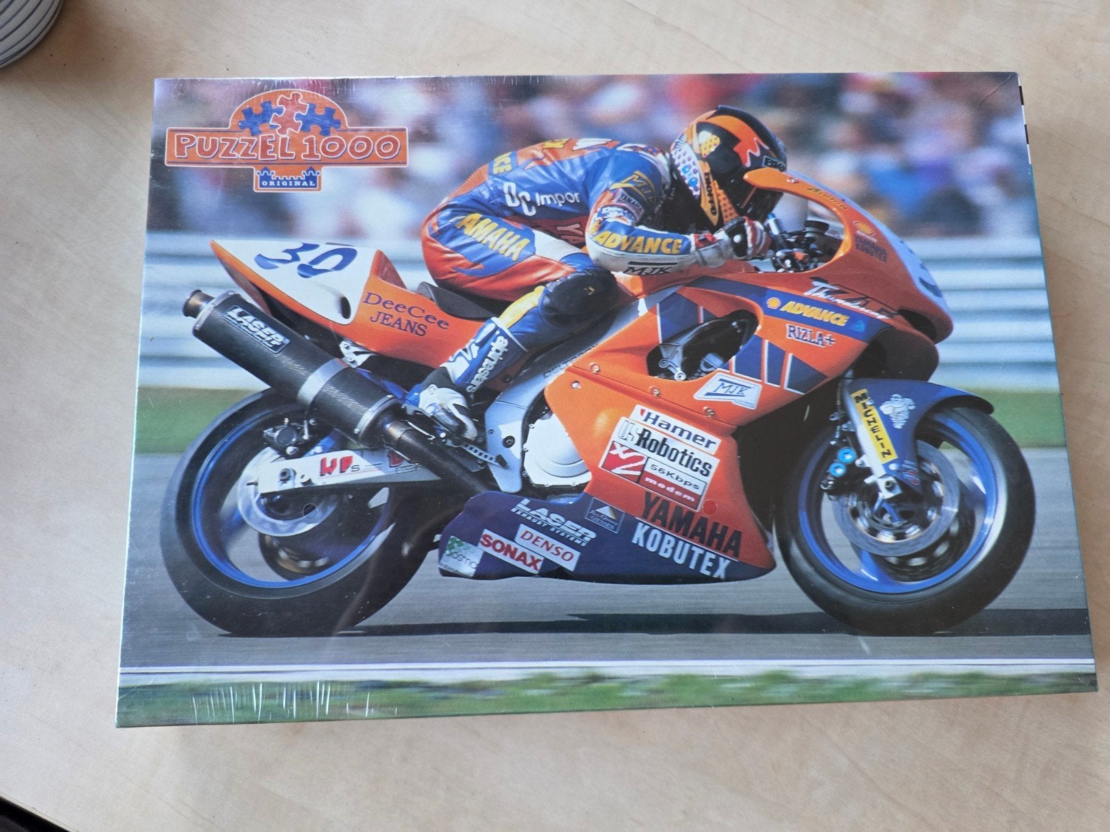 Puzzel 1000 stukjes Wilco Zeelenberg Yamaha, Ophalen of Verzenden, 500 t/m 1500 stukjes, Nieuw, Legpuzzel