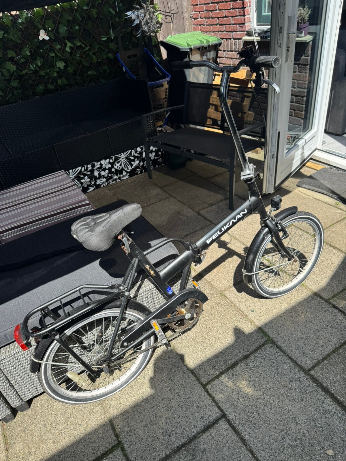 Pelikaan vouwfiets, Ophalen, Gebruikt, Terugtraprem