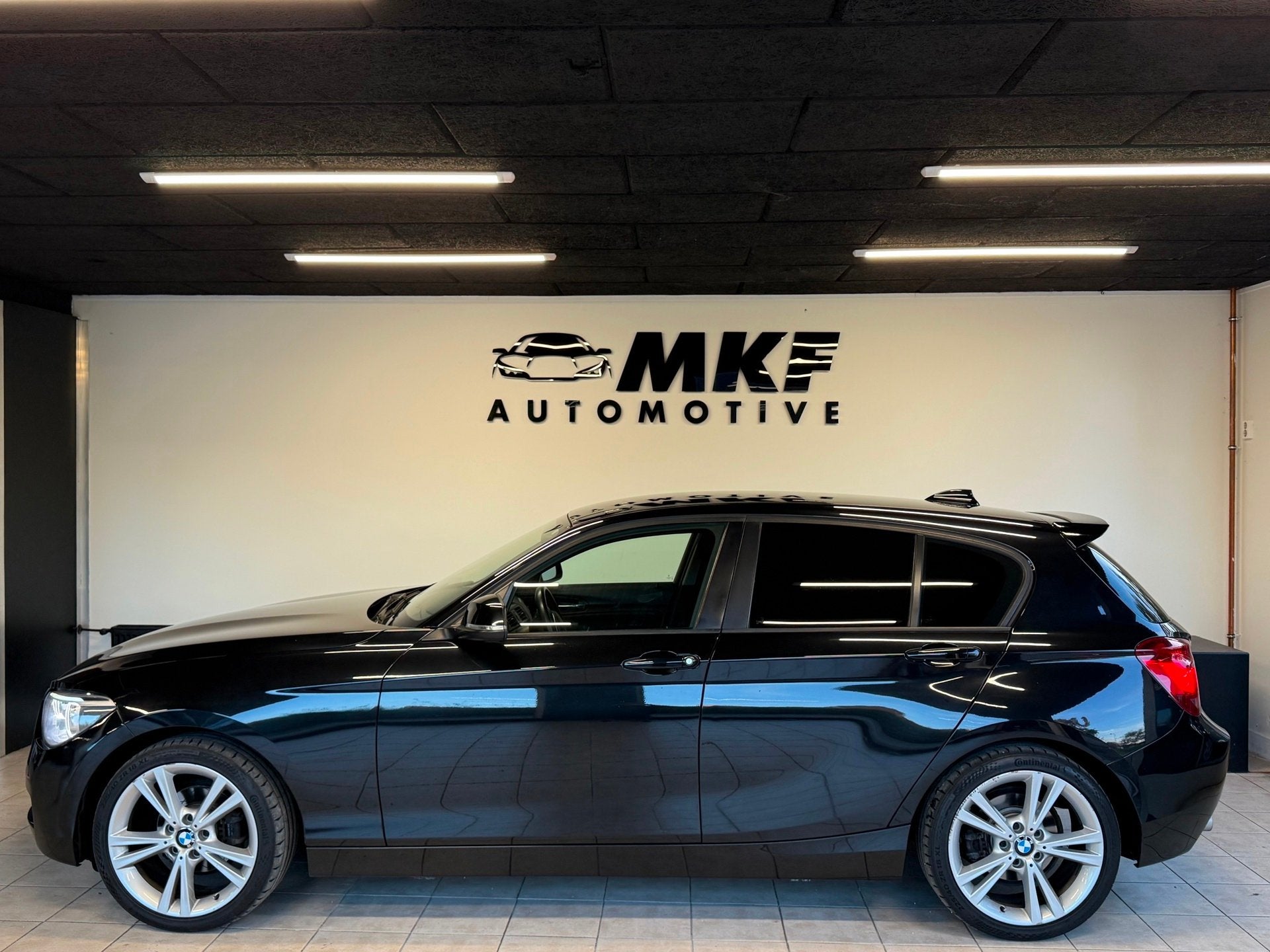 Foto 8 van BMW 1-serie 116D Business 2012 Zwart AIRCO|NAVI|XENON|NAP!