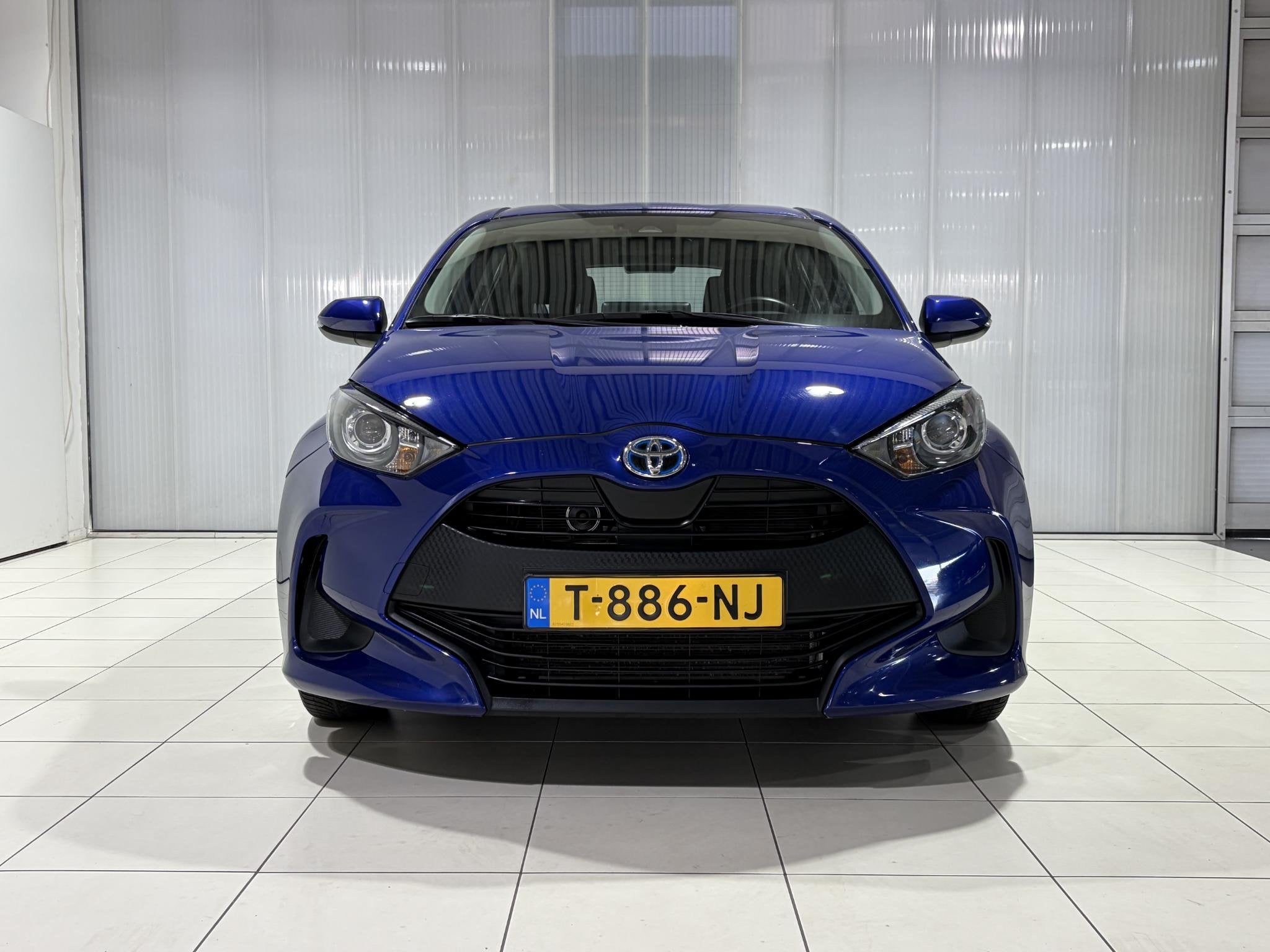 Toyota Yaris 1.5 Hybrid Active Navigatie af fabriek, 1e Eige, Auto's, Gebruikt, Blauw, 49 €/maand, Bedrijf