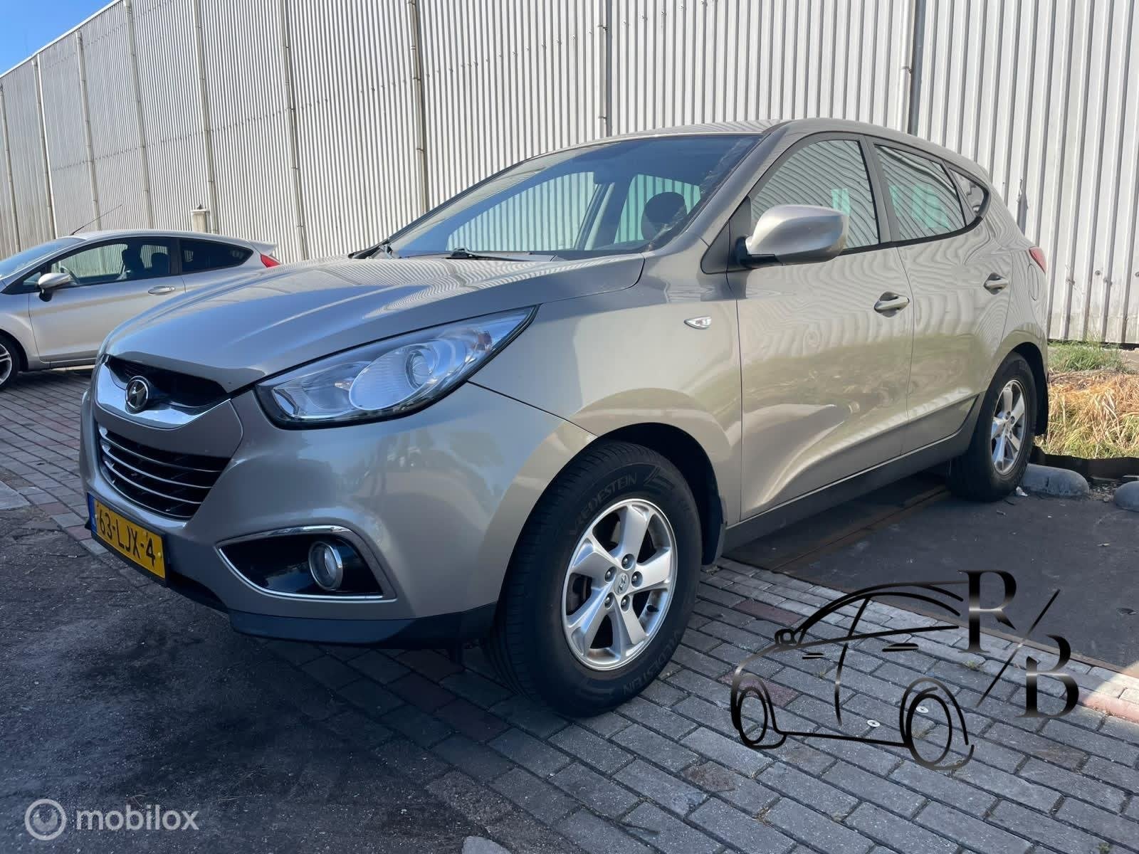 Hyundai ix35 2.0i Dynamic LPG ZEER MOOIE AUTO AIRCO CRUISE, Auto's, Stof, Gebruikt, Zwart, 4 cilinders
