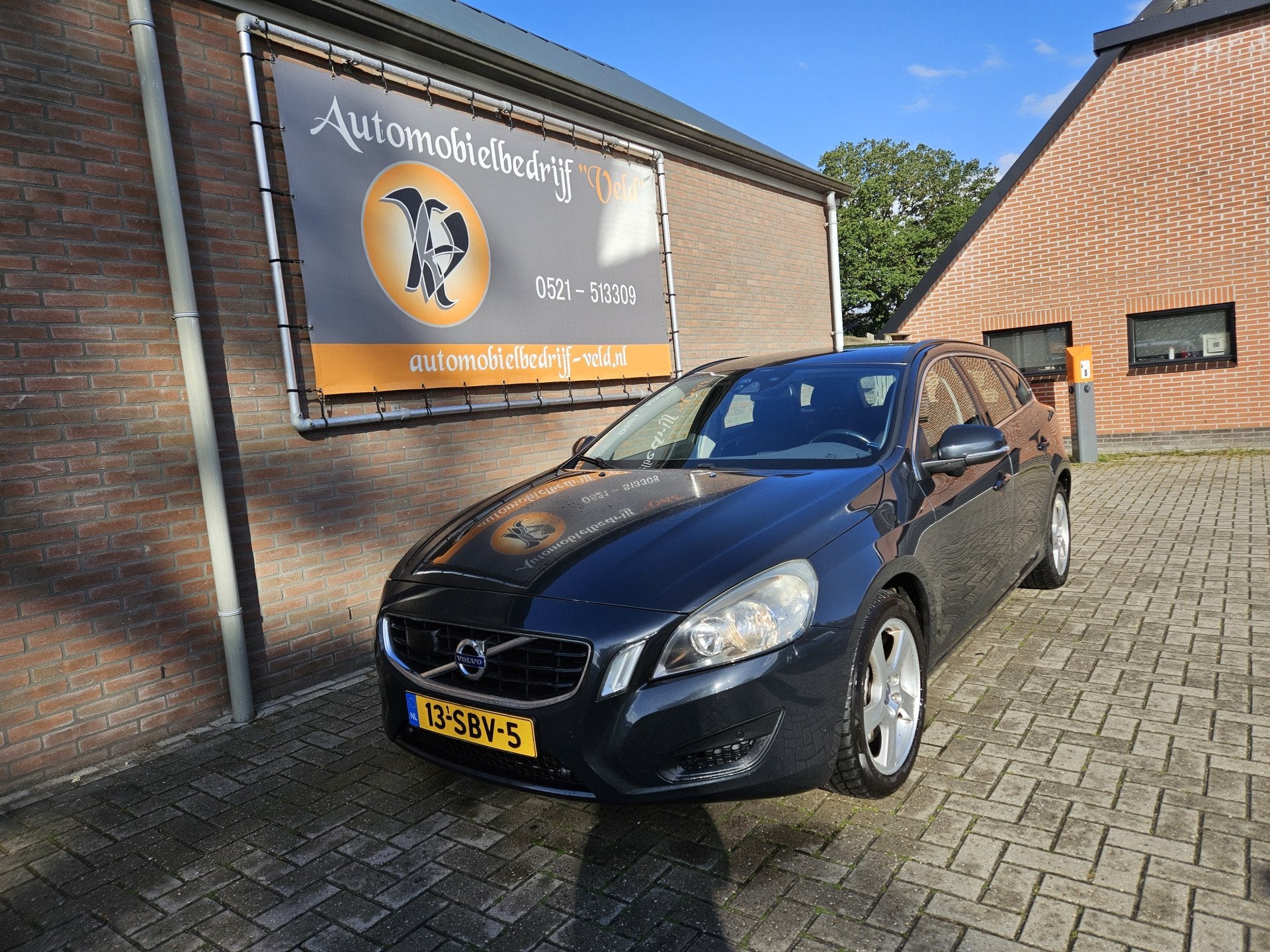 Volvo V60 2.0T Momentum (bj 2012), Auto's, Volvo, Voorwielaandrijving, Euro 5, Stof, Zwart