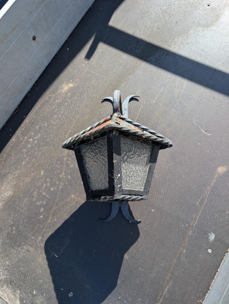 Smeedijzeren wand buitenlamp, Ophalen