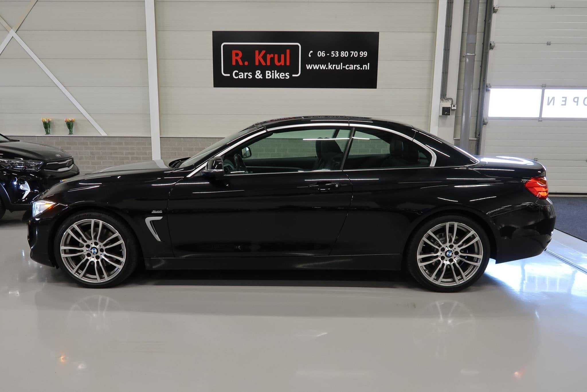 BMW 4-serie Cabrio 430i High Executive Sport 252pk Zwart Lee, Auto's, Automaat, Achterwielaandrijving, Gebruikt, 4 stoelen