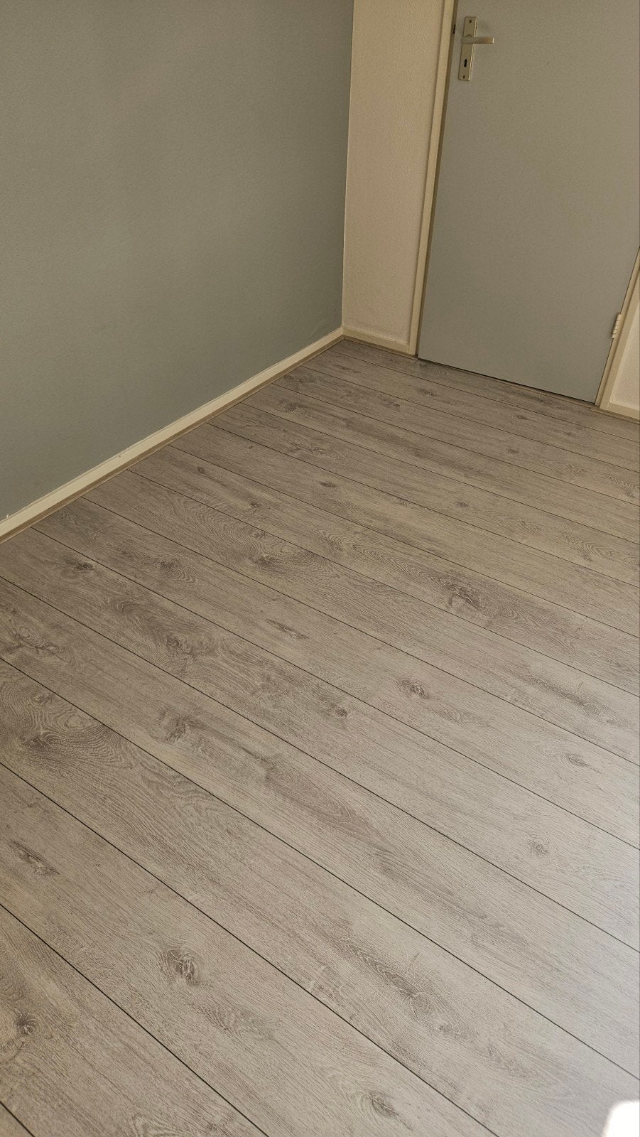 Laminaat 33m2, zelf uithalen, Huis en Inrichting, Stoffering | Vloerbedekking, Ophalen, Gebruikt, 25 tot 50 m², Grijs