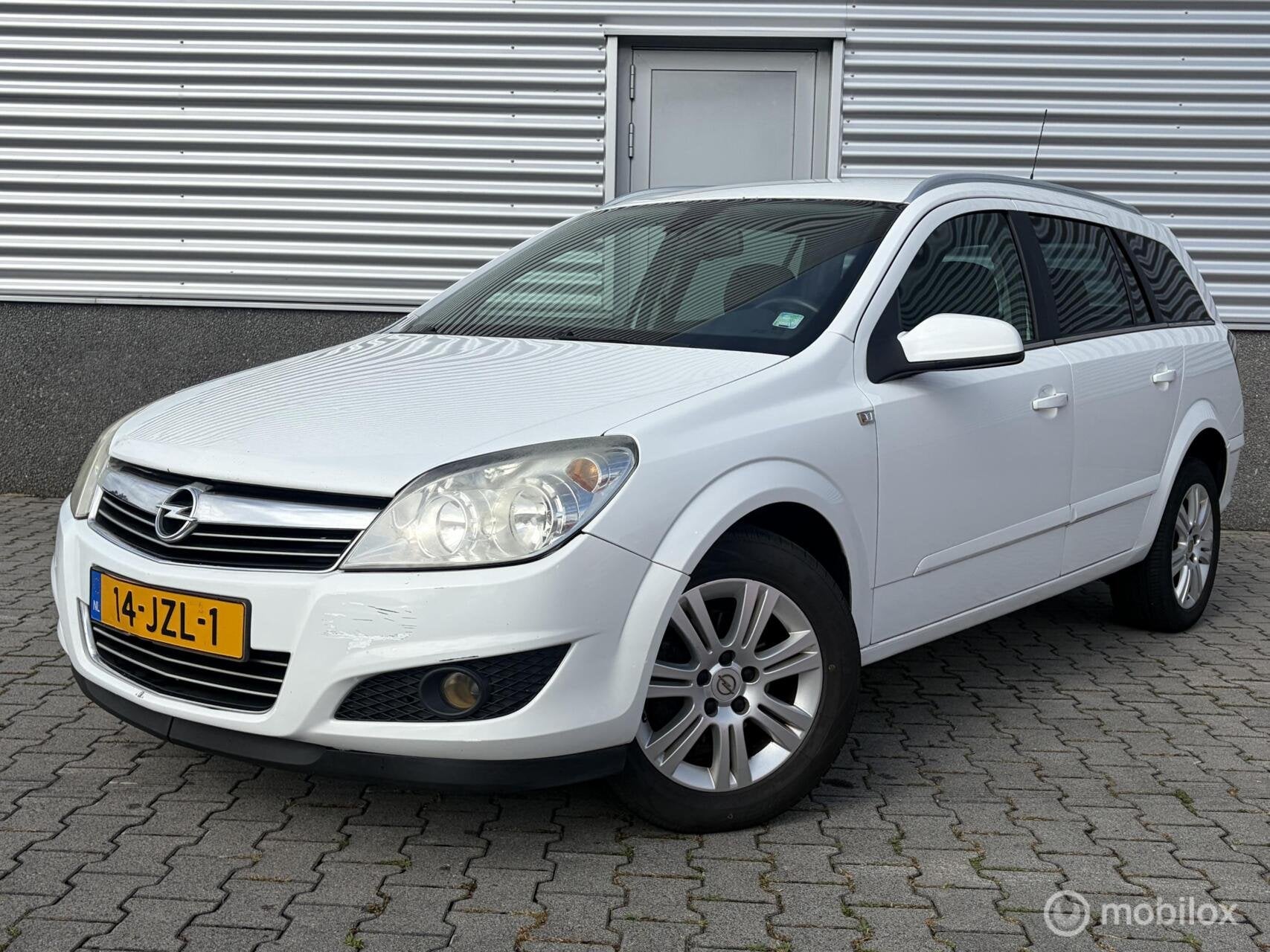 Opel Astra Wagon 1.8 Cosmo, Voorwielaandrijving, Gebruikt, Zwart, 1796 cc