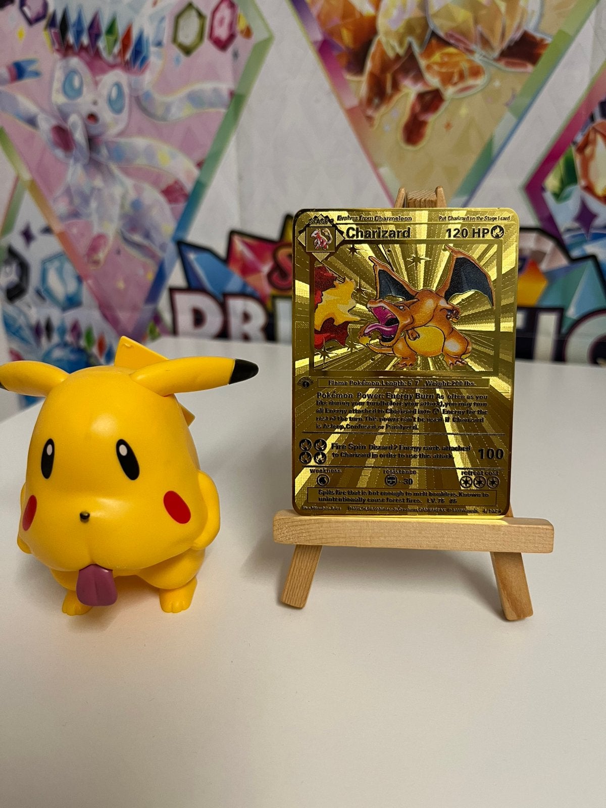 Charizard 1st edition metalen kaart goud, Ophalen of Verzenden, Nieuw, Losse kaart