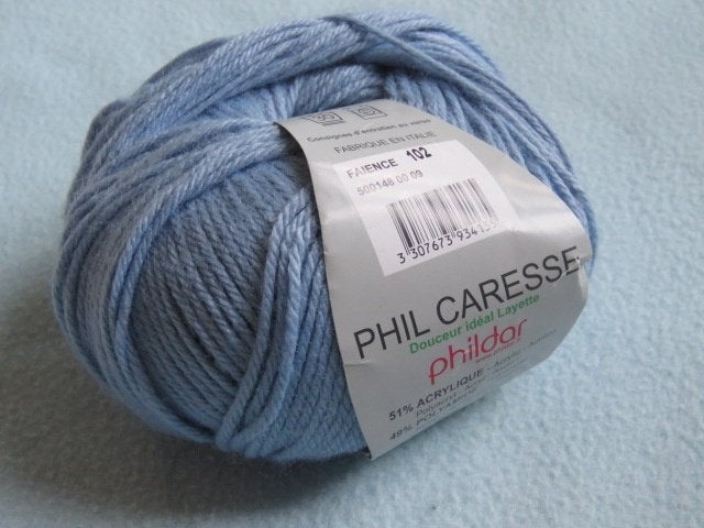 Nieuwe bol Phildar Phil Caresse lichtblauw 50 gram, Ophalen of Verzenden, Nieuw, Breien of Haken, Wol of Garen