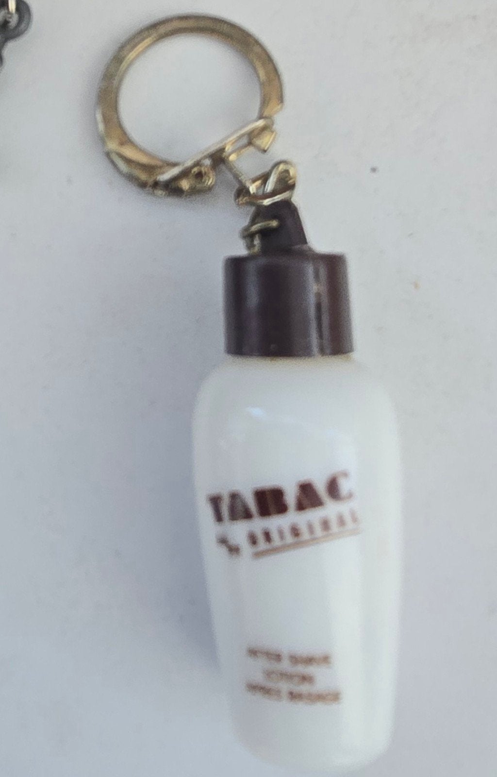 Vintage Tabac Original Sleutelhanger - After Shave Lotion, Ophalen of Verzenden, Gebruikt, Merk