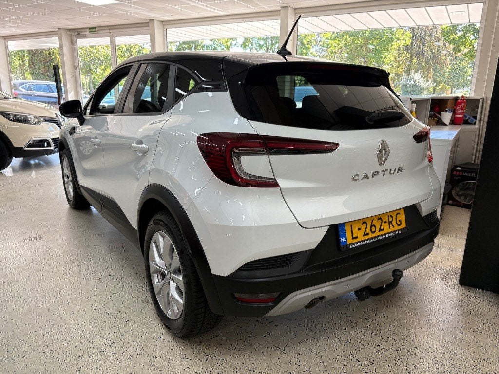 Renault CAPTUR 1.0 TCE Navigatie Airco Multimedia PDC Trekha, Auto's, Voorwielaandrijving, Gebruikt, Met garantie (alle), Wit