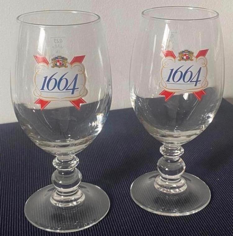 2 Bierglazen van 1664 Kronenbourg. Hoogte 16 cm., Ophalen of Verzenden, Zo goed als nieuw, Glas of Glazen, Overige merken
