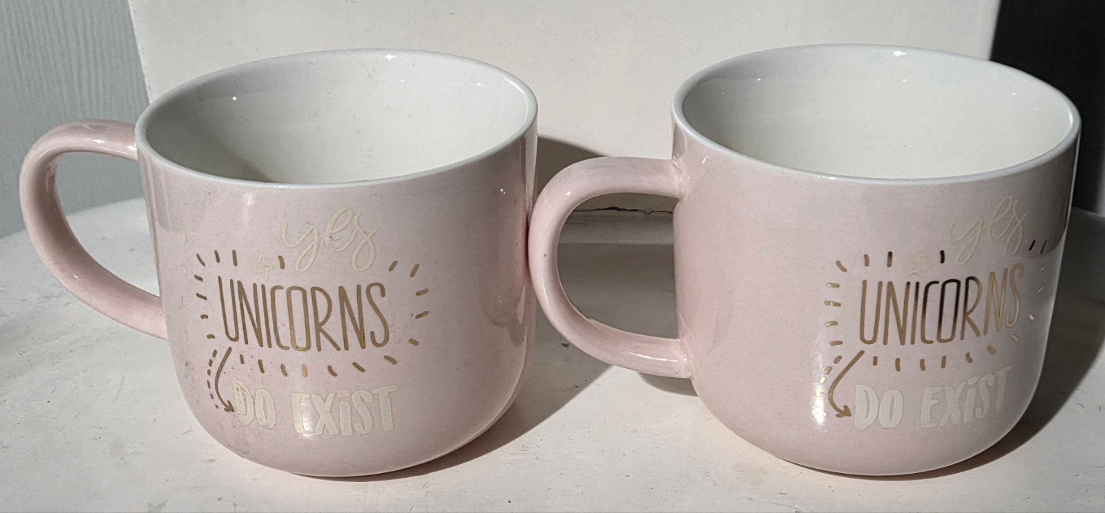 2 nieuwe 'Unicorns Do Exist' mokken,lichtroze Sinterklaas, Ophalen of Verzenden, Nieuw, Keramiek, Mok