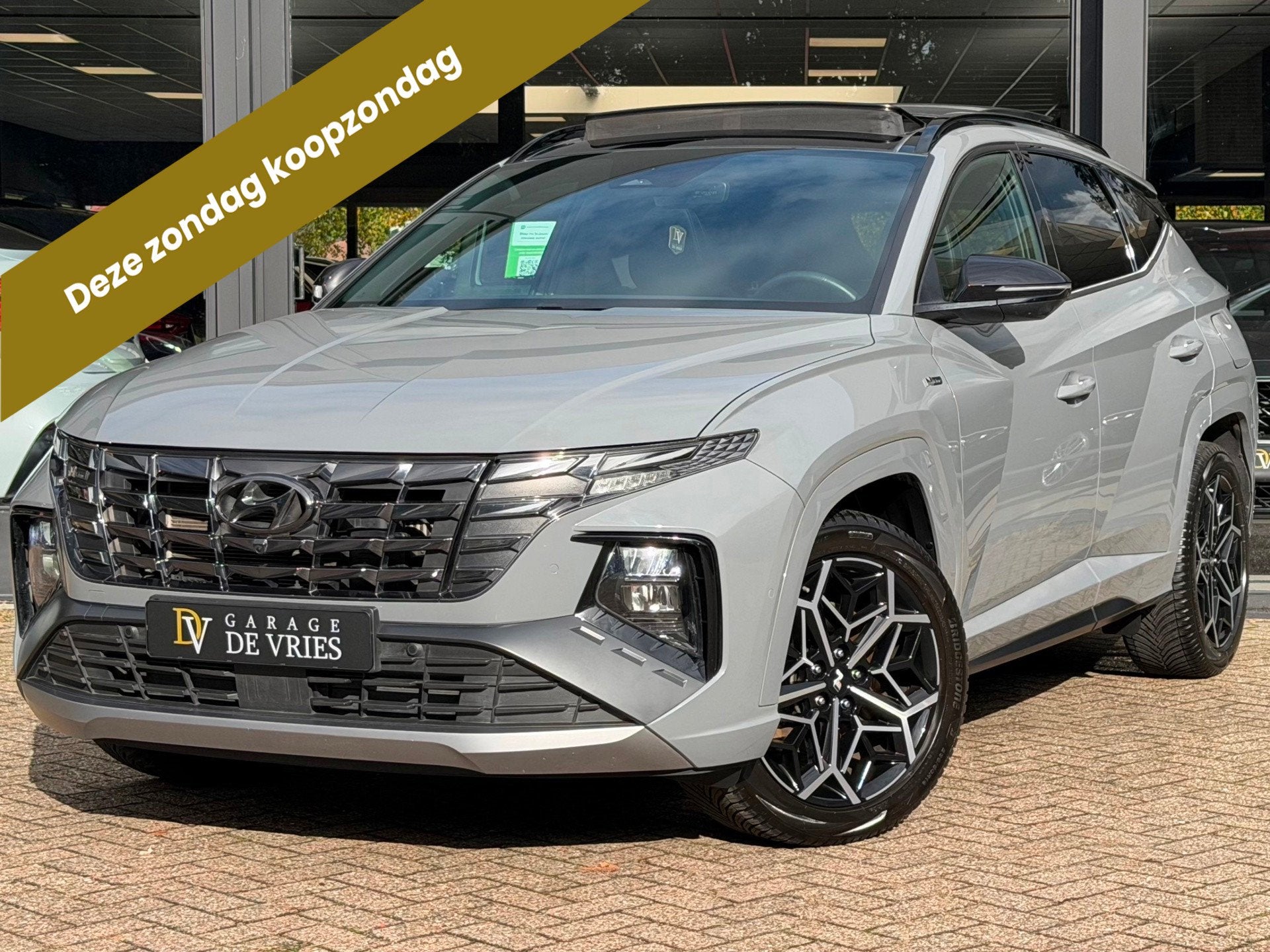 Hyundai Tucson 1.6 T-GDI HEV N Line Sky Panoramadak Full Opt, Auto's, Dealer onderhouden, Gebruikt, Zwart, 4 cilinders