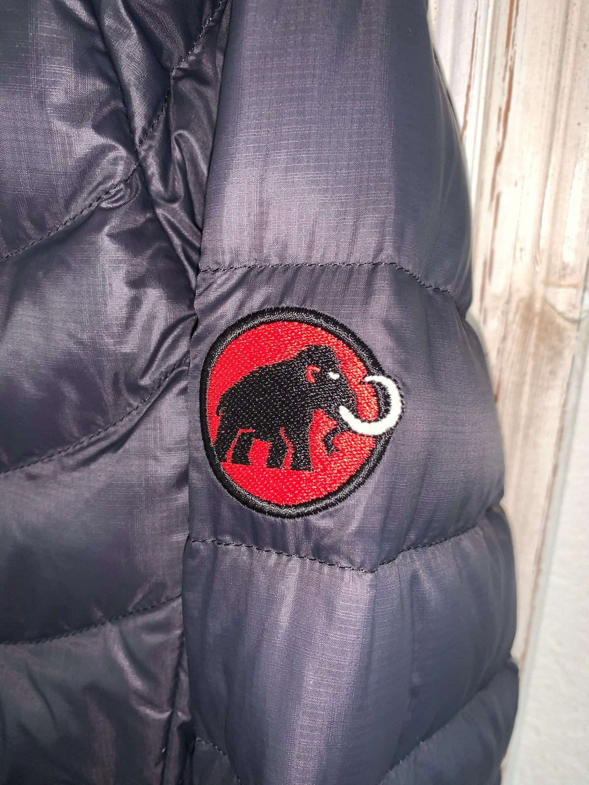 Mammut donsjas heren - Zo goed als nieuw maat S, Ophalen of Verzenden, Zo goed als nieuw, Maat 46 (S) of kleiner, Grijs