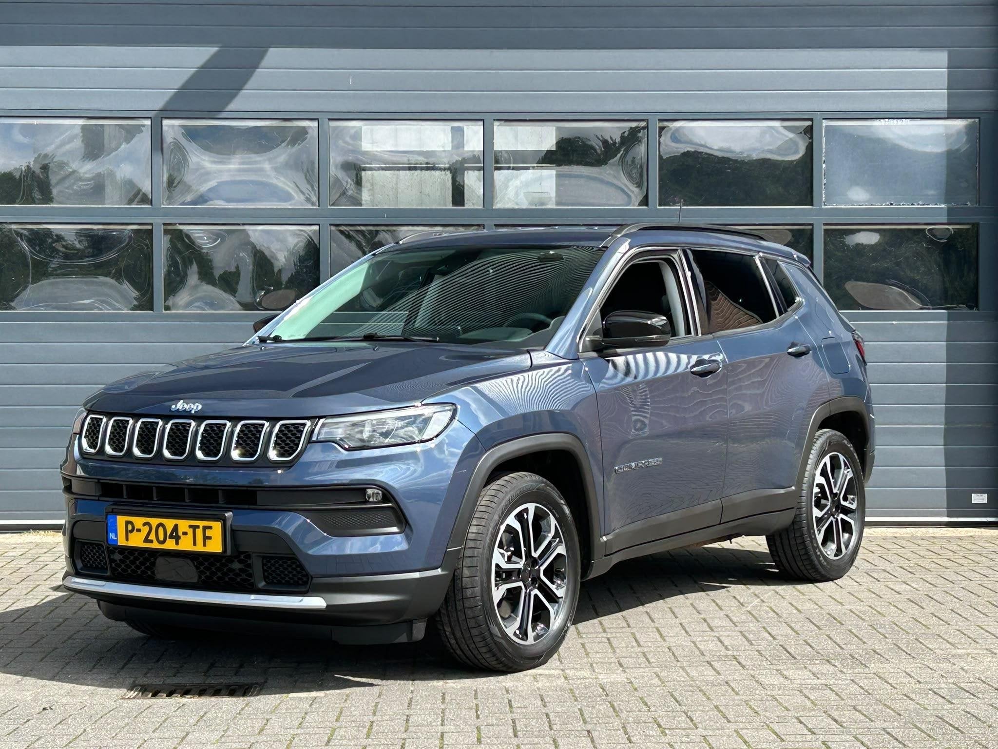 JEEP COMPASS 4xe 240 PLUG-IN HYBRID ELECTRIC LIMITED I WINTE, Automaat, 4 cilinders, Met garantie (alle), Blauw