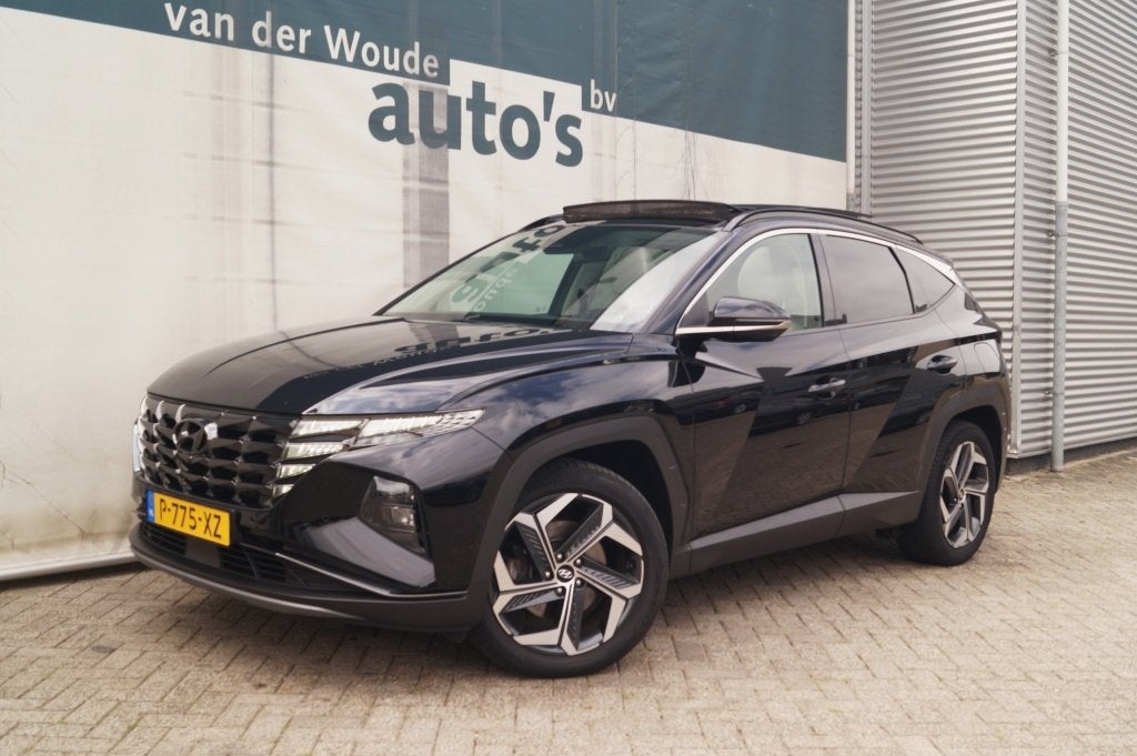 Hyundai Tucson 1.6 T-GDI PHEV Premium Sky -LEER-PANO-TREKHAA, Auto's, Automaat, 14 kWh, Gebruikt, Euro 6