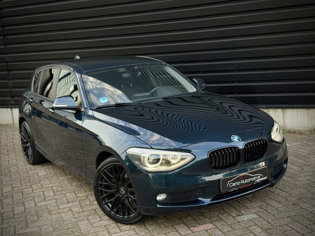 Bmw 1-serie 116i Executive AUT|CLIMA|XENON|NAVI|PDC, Dealer onderhouden, Gebruikt, 4 cilinders, Blauw