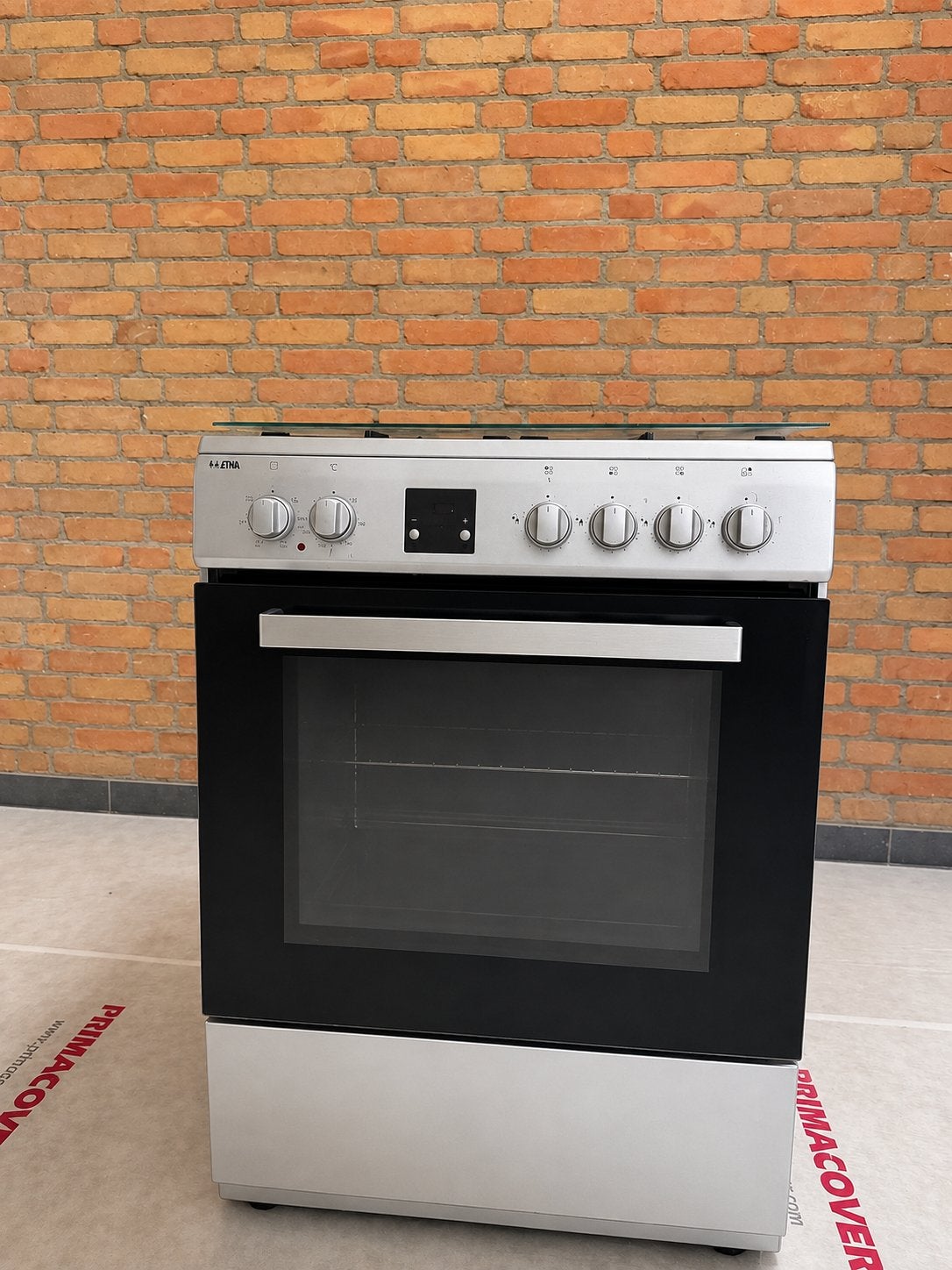 Etna RVS gasfornuis met elektrische oven werkt uitstekend, Witgoed en Apparatuur, Fornuizen, Ophalen, 4 kookzones, Zo goed als nieuw