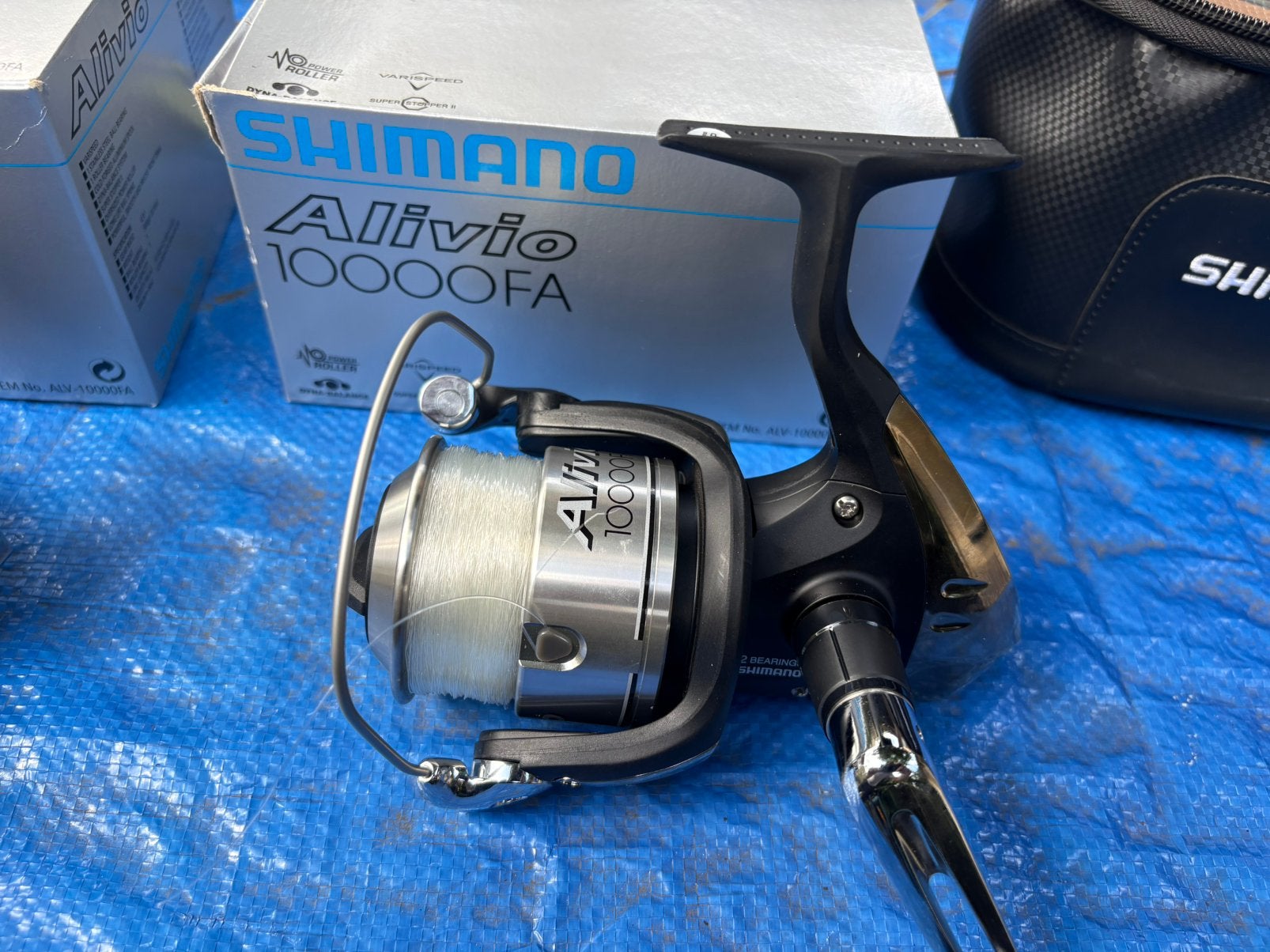 Shimano alivio 10000 FA 2x nieuwstaat met dozen en tassen., Ophalen of Verzenden, Zo goed als nieuw, Molen