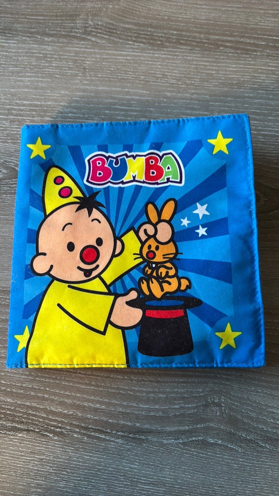 Bumba boekje baby met knisperend geluid, Ophalen of Verzenden, Zo goed als nieuw, Rammelaar, Met geluid