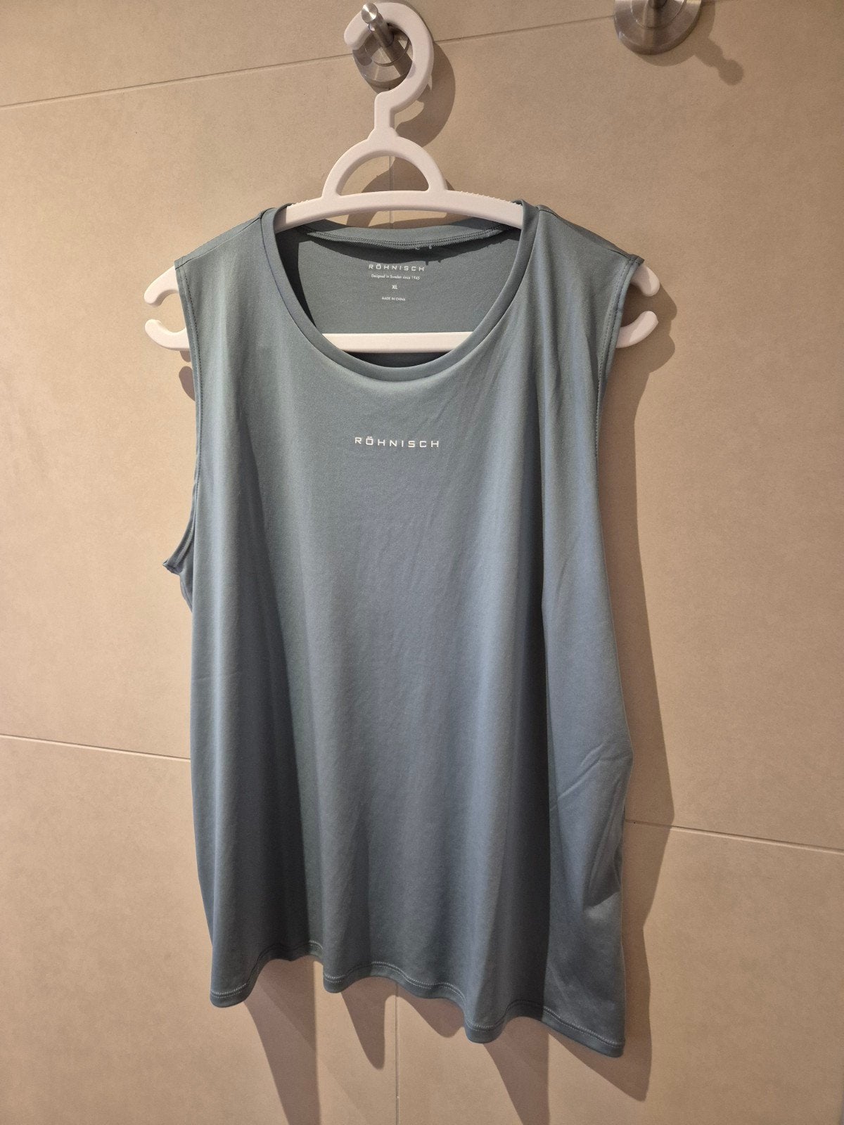 Röhnisch sporttop XL - Nieuw, Kleding | Dames, Blauw, Maat 42/44 (L), Nieuw, Ophalen of Verzenden