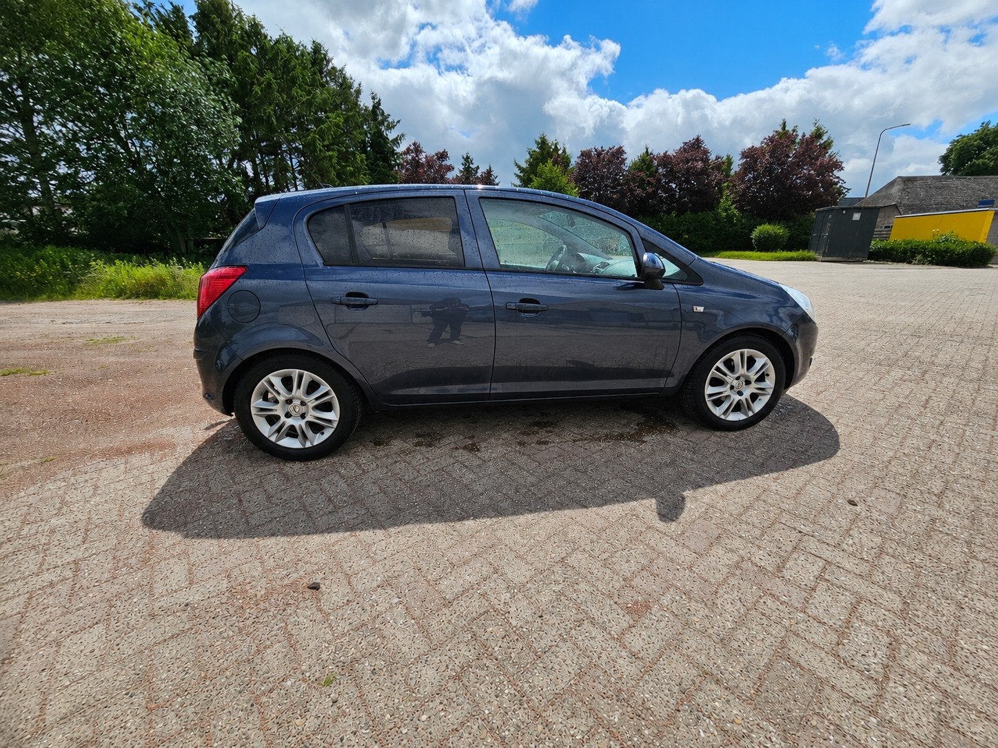 Opel Corsa 1.4 16V 5D 2008, Auto's, Voorwielaandrijving, Zwart, 4 cilinders, Blauw