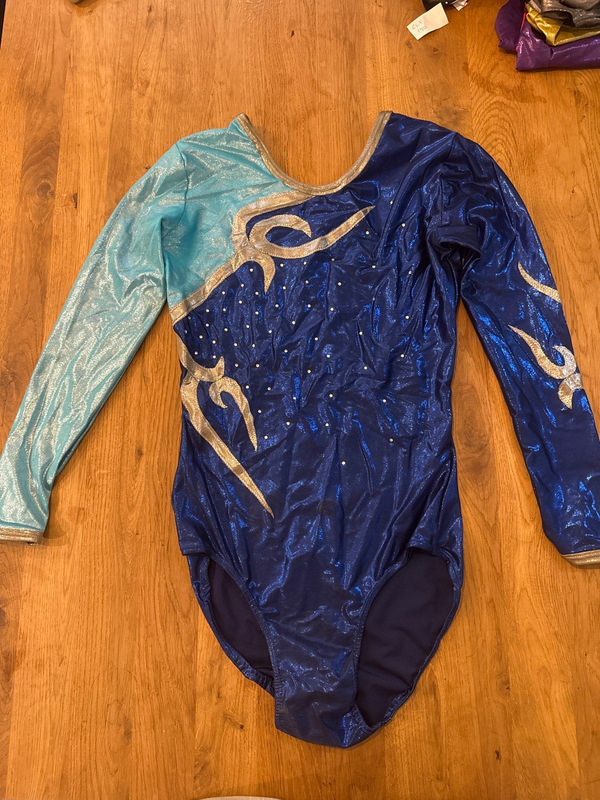 Turnpakje lange mouwen blauw/lichtblauw met goud, Maat 38/40 (M), Blauw, Overige typen, Ophalen of Verzenden