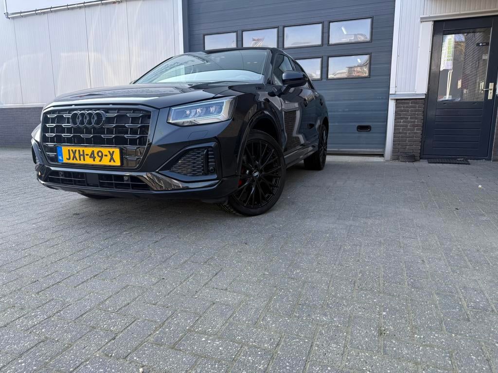 Audi Q2 35 Tfsi 150pk S Tronic 2021 Zwart. 56745 km gelopen, Auto's, Audi, Stof, 4 cilinders, Zwart, 690 kg