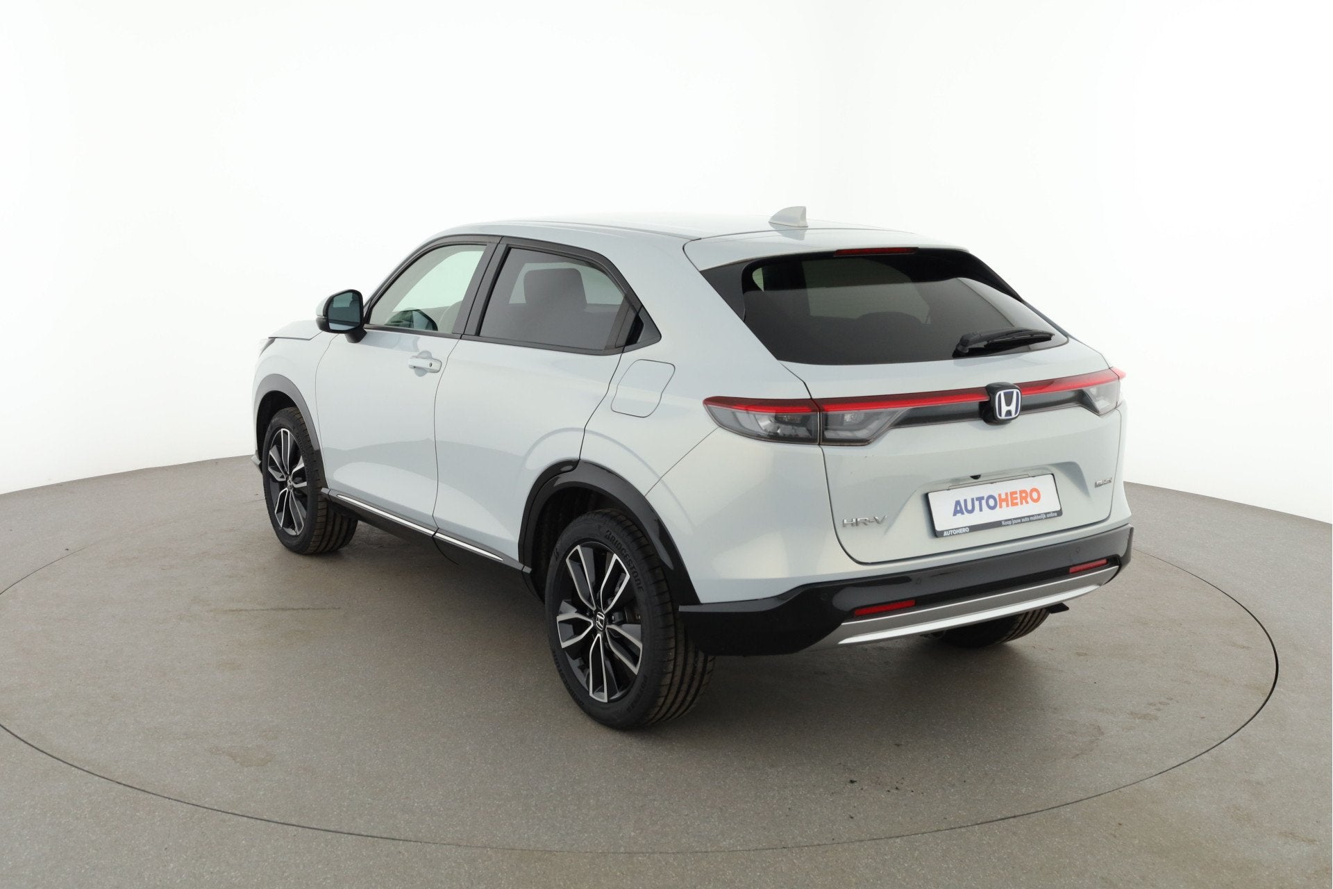 Honda HR-V 1.5 e:HEV Business Edition YX65393 (bj 2022), Auto's, Met garantie (alle), Leder en Stof, Wit, Adaptive Cruise Control