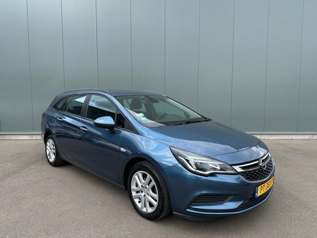 Opel Astra Sports Tourer 1.6 CDTI Online Ed. TREKHAAK | NAVI, Auto's, Voorwielaandrijving, Euro 6, 4 cilinders, Blauw