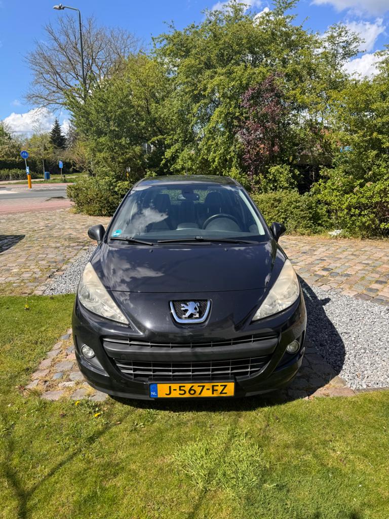 Peugeot 207 1.6 VTI 16V 5DRS 2012 Zwart, Auto's, Voorwielaandrijving, Zwart, Leder en Stof, Zwart